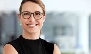 successful businesswoman smiles in office