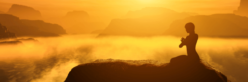 Woman meditating in a golden sunset illustrating ways to feed your soul and reconnect with inner joy."