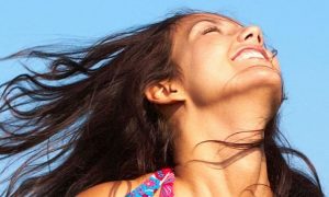 woman happy exciting face gratitude life in blue sky