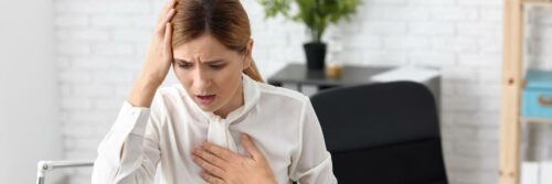 Woman having Panic attack in workplace
