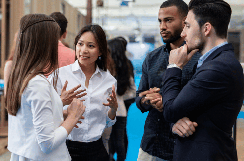 Group of multicultural people at work having a conversation