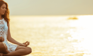 Woman meditating in Golden Light