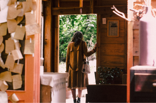 Woman stepping out to live True meaningful life
