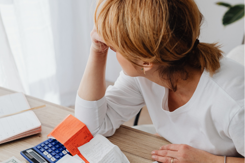 Woman concerned about her financial stability and health
