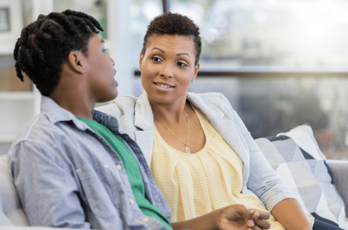 Student talking to a parent about academic pressure