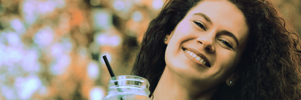 A person learning how to recharge your social battery naturally with alcohol alternatives.