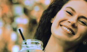 A person learning how to recharge your social battery naturally with alcohol alternatives.
