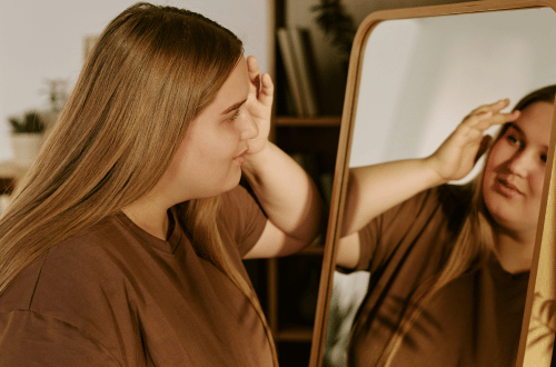 A young woman accepting herself on her path to true empowerment.