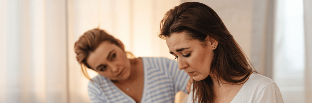 Emotional Contagion as woman takes on emotions while comforting another woman