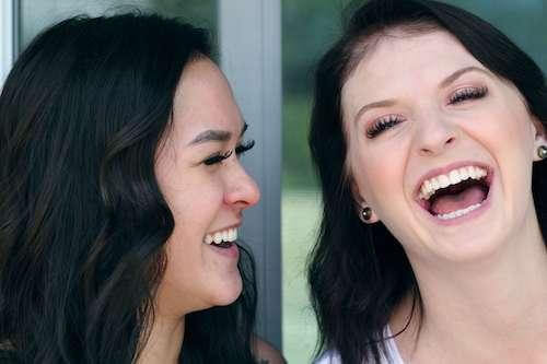 two friends laughing