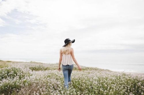 Woman walking in a field