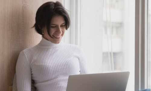 Woman Connecting Via Computer