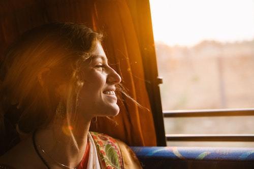 happy woman on the train