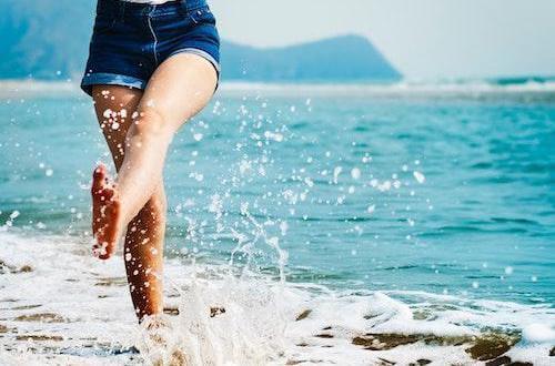 Woman walking through water