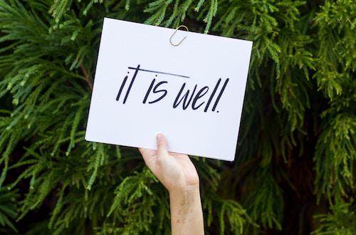 Person holding paper, saying it is well.