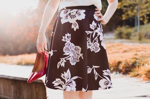 Woman holding High Heels