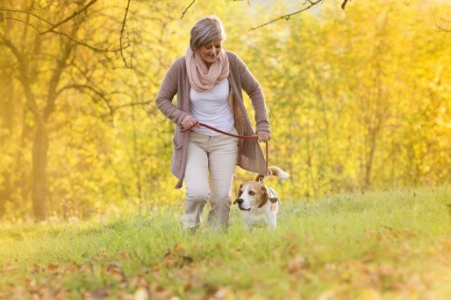 Woman walking her dog