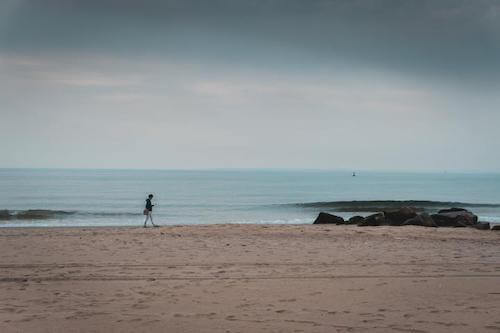 woman walking on a beach