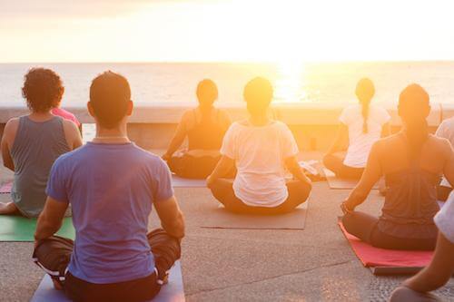 group of people meditating