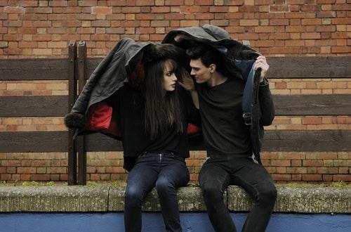 Couple Sharing Jacket