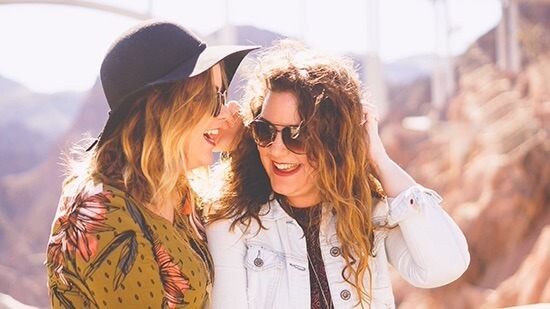 two friends laughing together