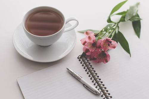 tea flowers and notepad