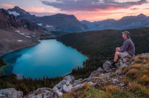 Man looking out at a lake