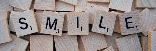 wooden blocks detailing word smile