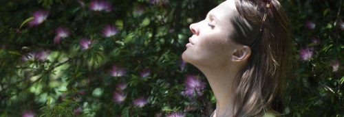 woman eyes closed gratitude life focuses on breathing