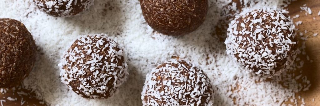 chocolate balls topped with coconut slices