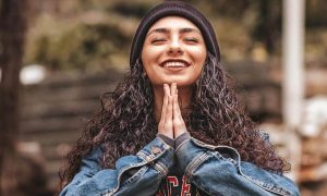 woman breathing smiling gratitude life in park