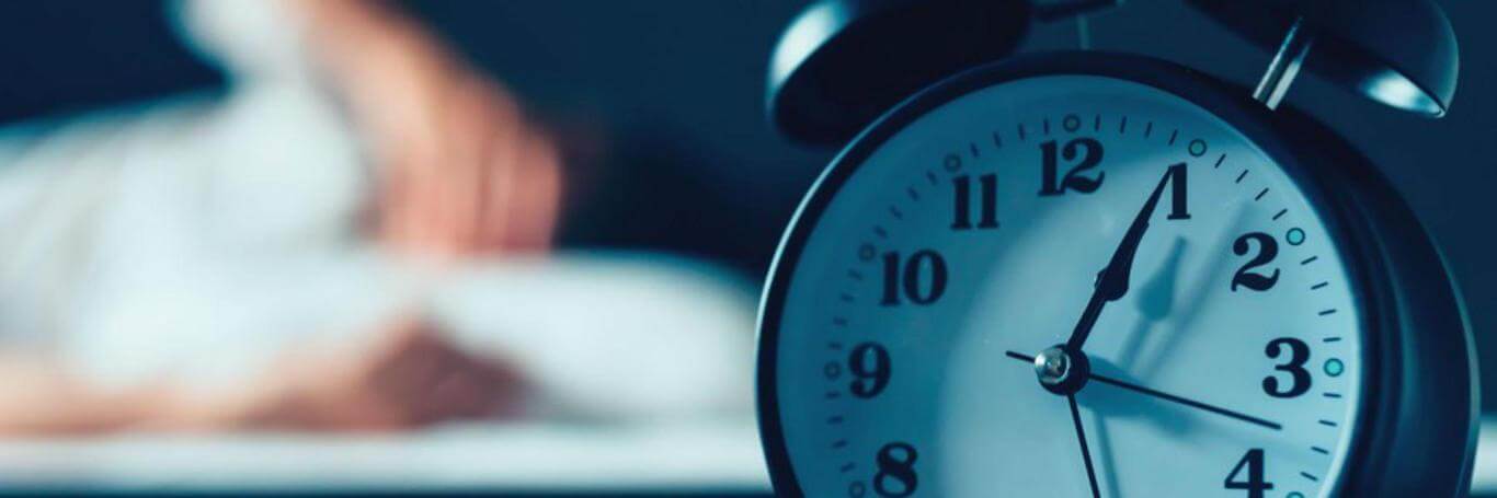 Can't Sleep? Try These 4 Restorative Poses Right in Bed